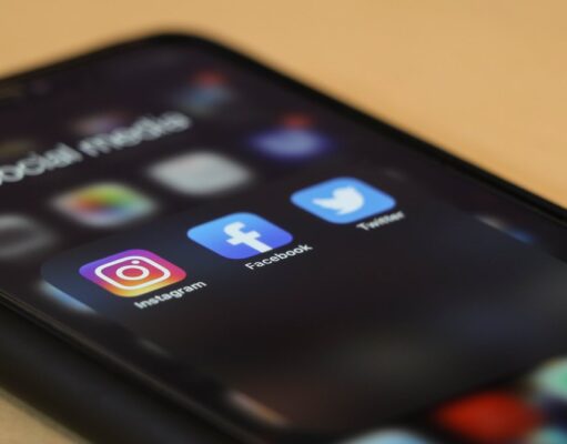 Social media marketing myths to leave behind in 2021 Social media apps on a phone.